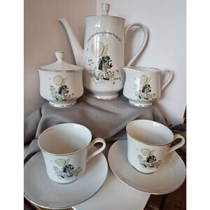 Holly Hobbie Tea Pot, Creamer, Sugar, and 2 Tea Cups & Saucers - Vintage 1973